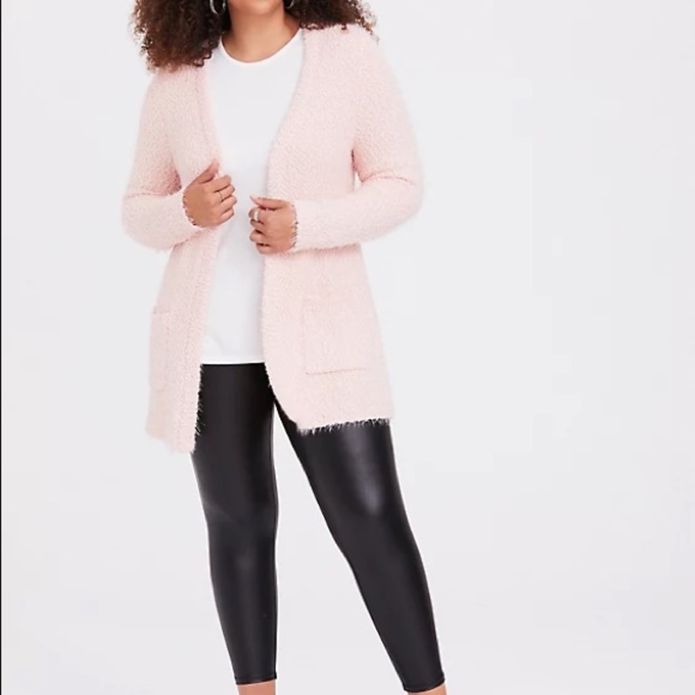 Light pink fuzzy cardigan.
